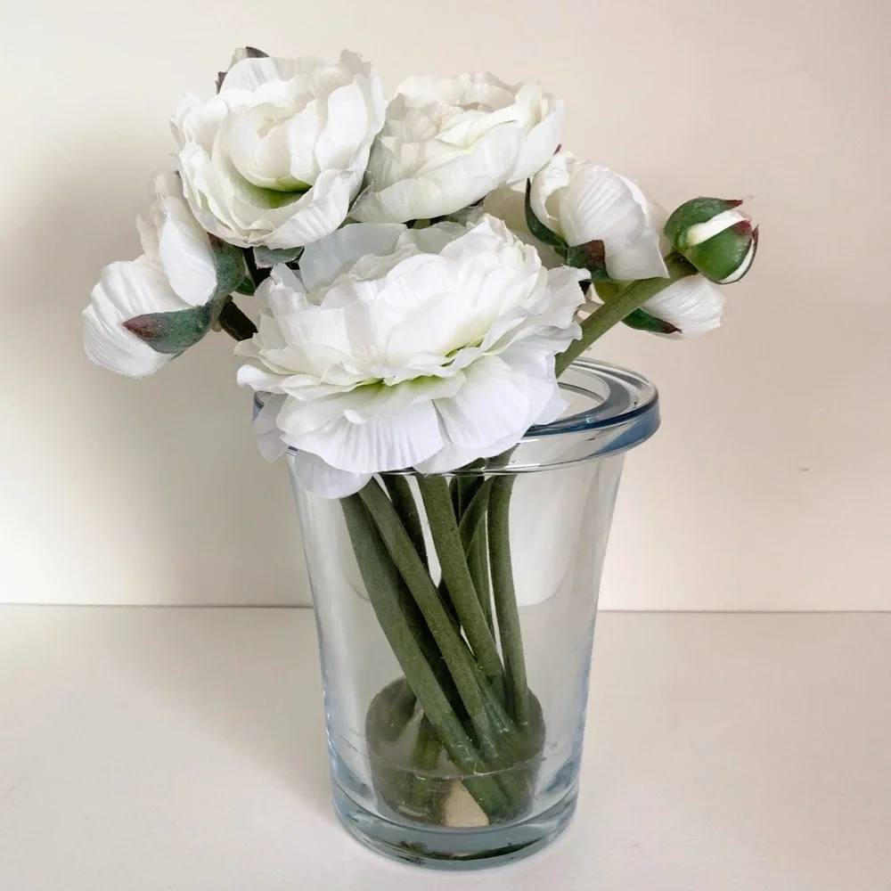Thomas O’Brien Faux flowers in blue glass vase
